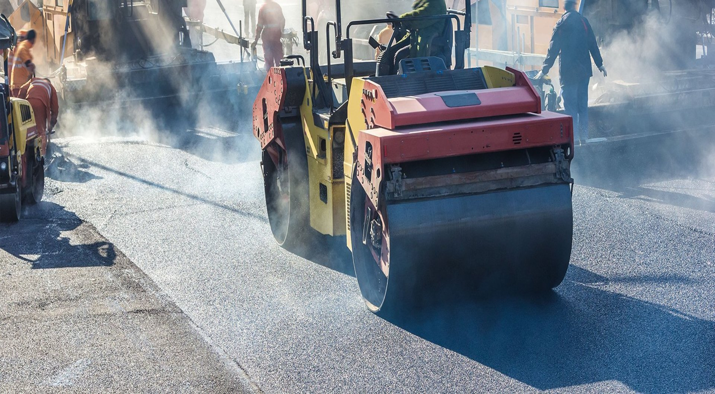 Asphalt Roller working on fresh asphalt