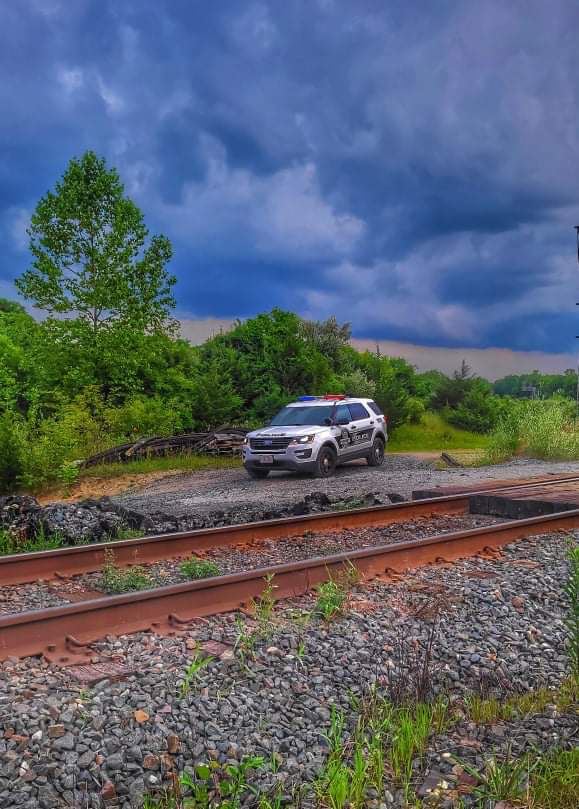 Sidney cruiser pictured by train tracks