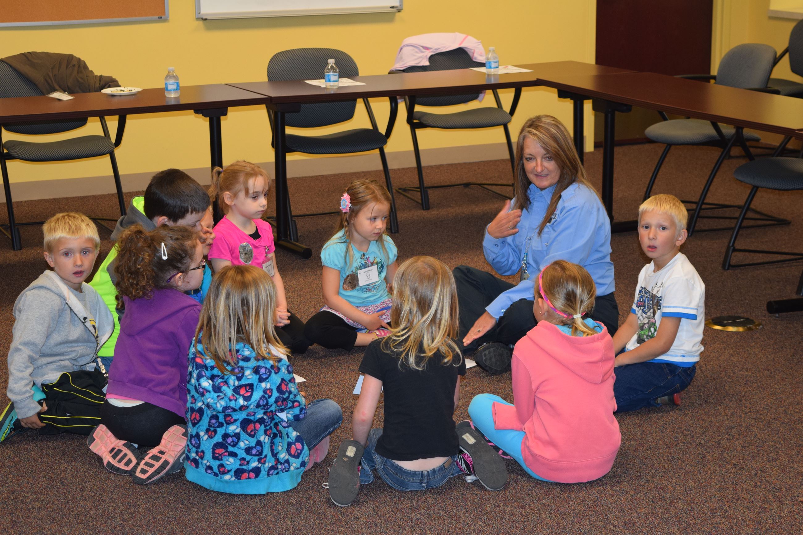 Dispatcher Pae speaks to Children